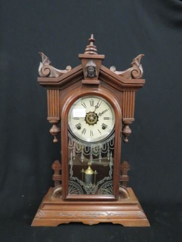 Gilbert Carved Parlor Clock,: Jenny Lind top, silver stenciled glass, 23" tall, working, 8-day, spring, bell strike.