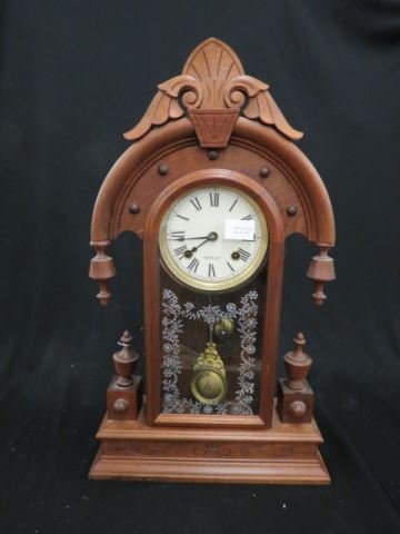New Haven Mantle Clock, arch top,: fancy carved case, silver garland stenciled door, 24" tall, working.