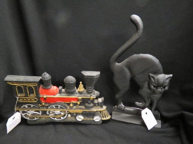 2 Cast Iron Figural Doorstops,: cat and locomotive, not old