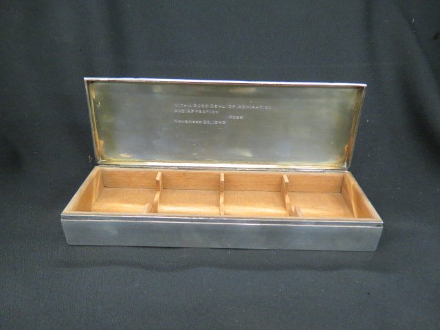 Cartier Sterling Silver Box,: presented to Lt. Col. Dudley S. Dean from famous playwright Moss Hart, November 30, 1943, 3.5" X 9.75", wood lined, with original playbill from "Winged Victory", total 518 grams....Winged Victory is a