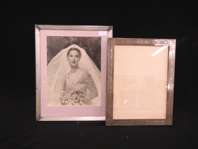 2 Large Picture Frames, one sterling and one appears: to be silverplated, no mark found on it,overall 10.5" X 13" and 12" X 14.5".