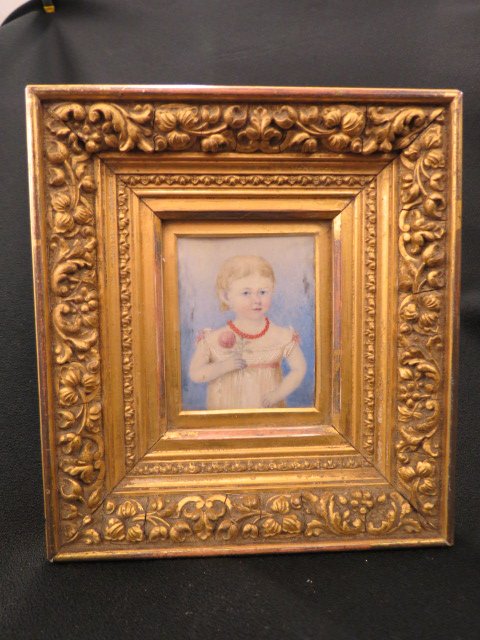 Miniature Painting of Young Child,: holding a flower, coral necklace, 2.25" X 3", 19th centry, in ornate gold gilt frame 6.5" X 6" overall.