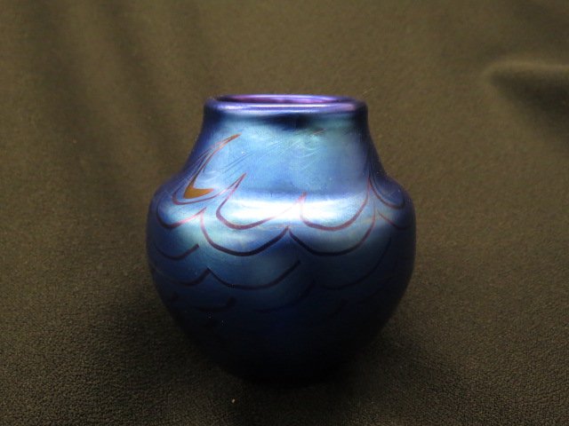 Orient and Flume Art Glass Vase,: rich blue irridescent with wave decor, 3.5", signed, excellent...Orient & Flume produces fine art glass for the collector. These signed pieces capture nature's inspiration in both iridescent and cryst