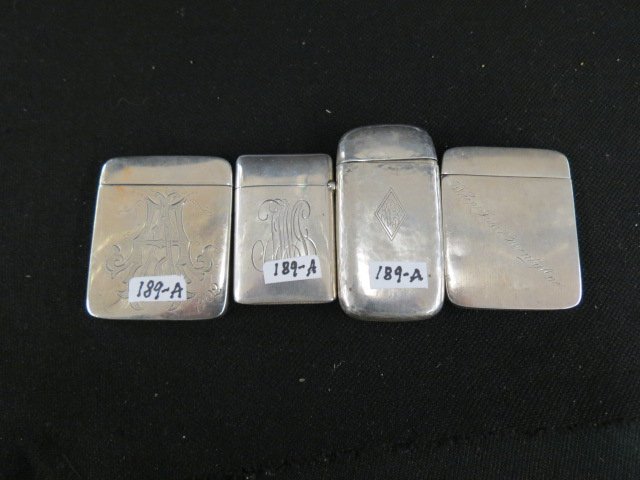 4 Sterling Silver Match Safes,: circa 1910, one marked "When I was Twenty-one", largest is 2" X 2 3/8".