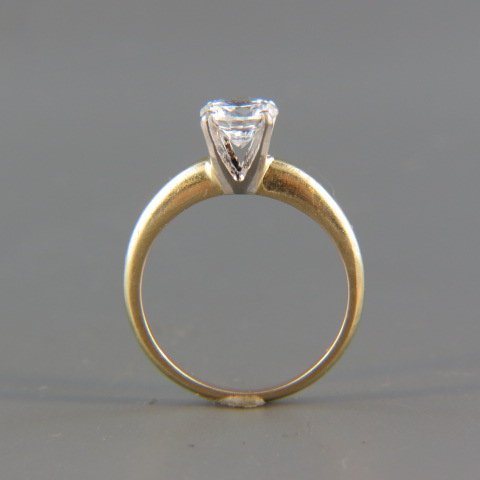 Solitaire Ring,: oval CZ, 14k Tiffany style setting, currently size 6.5".