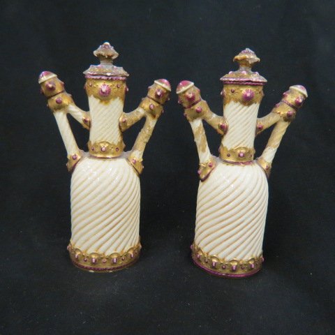 Pair of ZsoInay Porcelain Bottles,: Art Nouveau style handles, gold and jeweled decor on swirling 5" body, early castle mark, 6", repair to hadles....Zsolnay pottery was made in Hungary after 1853 and was characterized by Persian, Art N