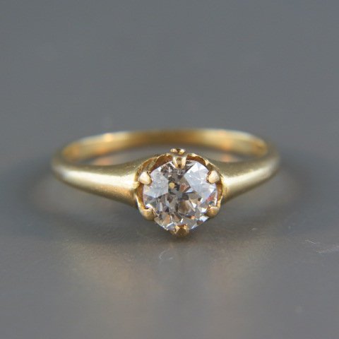Diamond Solitaire Ring,: .80 carat early mine cut, 14k yellow gold, with appraisal of $4,350, currently size 5.5.
