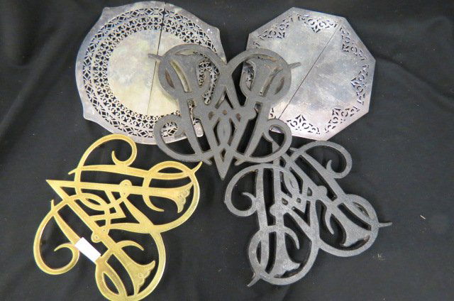5 Trivets,: English brass and iron, two are silverplated.