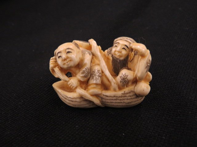 Carved Ivory Netsuke of Two Men in Boat, (1 of 4)