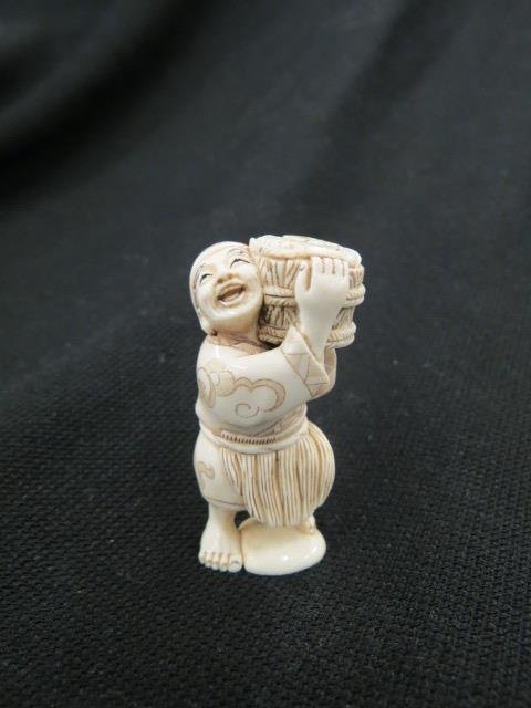Carved Ivory Netsuke of a Jolly Man, (1 of 4)