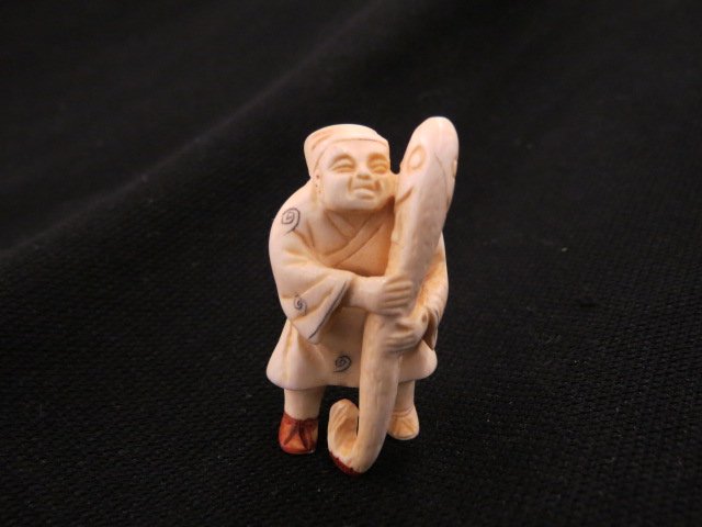 Carved Ivory Netsuke of Man (1 of 4)