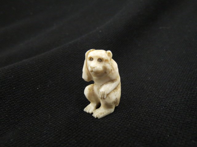 Carved Ivory Netsuke of a Monkey, (1 of 3)