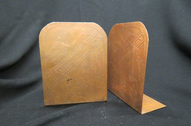 Pair of Arts & Crafts Bookends,: scarce etched Western scene, 6 1/2"....The Arts and Crafts movement was an international movement in the decorative and fine arts that flourished in Europe and North America between 1880 and 1910,[1] 