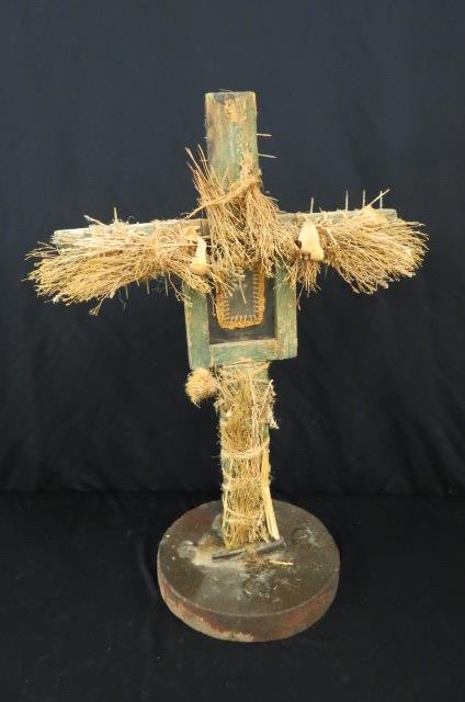 Folk Art Cross,: wood with straw, a trio of nails at base, depiction of Christ in center, 27" tall.
