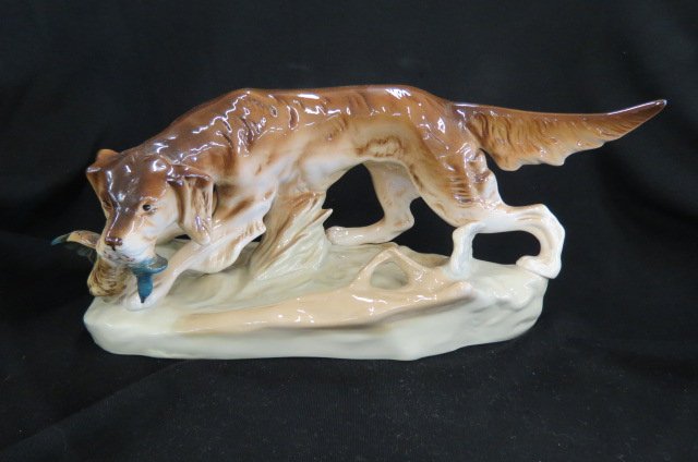 Royal Dux Porcelain Figurine of a: hunting dog, retriever with mallard, 5" tall, 12 1/2" long, excellent.