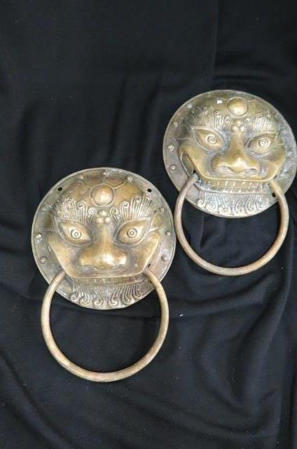 Pair of Chinese Brass Architectual Elements,: foo dog heads, ring trim, 7 1/2" diamter heads.