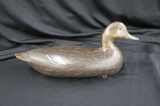 Charles Perdew Duck Decoy, carved wood, painted,: glass eyes, signed on lead weighting, 16 1/4" long, Henry, Illinois famous carver....Charles and Edna Perdew of Henry, Illinois, combined their talents to become famous folk artists in Central Illinoi