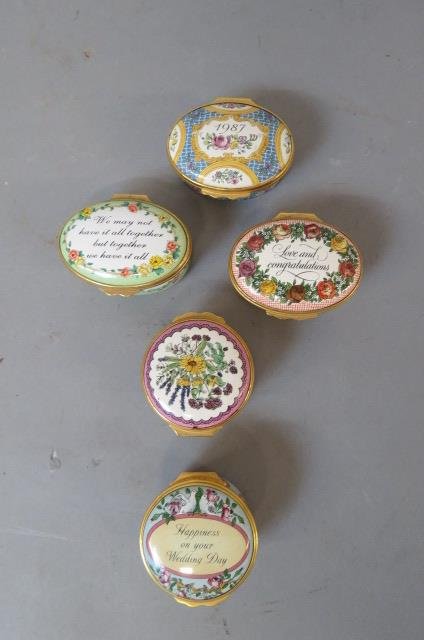 5 Halcyon Days Enameled Boxes,: round and oval, in original boxes, include floral, love, congratulations, wedding day and more, all excellent....Halcyon Days was founded in 1950 as an emporium of antique gifts in Mayfair, London. To