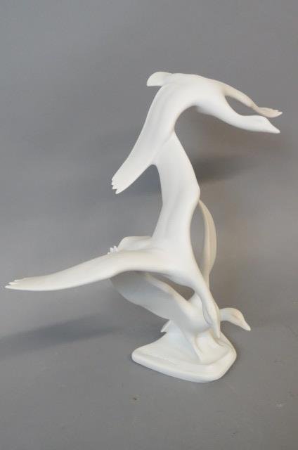 Kaiser Porcelain Figurine of Geese in Flight,: white satin, #390, artist signed S. Bochmann, 10" x 13", excellent....The Kaiser Porcelain company was founded in 1872 by August Alboth in Coburg, Germany; although his descendants, Willi Alboth and G