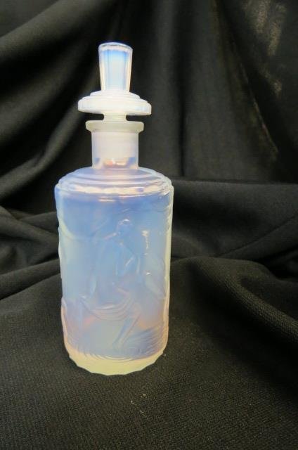 Sabino French Opalescent Art Glass Perfume Bottle: Art Deco style frolicking nudes, 5", signed, excellent....Sabino glass was made in the 1920s and 1930s in Paris, France. Founded by Marius-Ernest Sabino (1878-1961), the firm was noted for Art Deco la