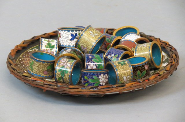 20 Chinese Cloisonne Napkin Rings,: various floral and colors, 1.25", on a 7.5" Satsuma plate with bamboo border.