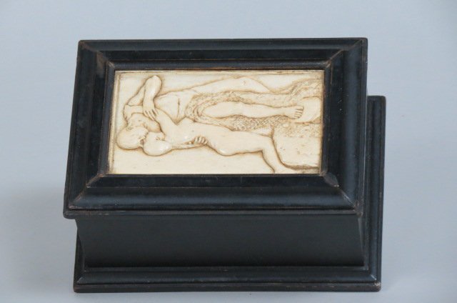 European Carved Ivory & Ebony Box,: "The Kiss", young lovers in a nude embrace, ivory panel is 2.75" x 5", box is 5" x 7" x 4", 19th century.