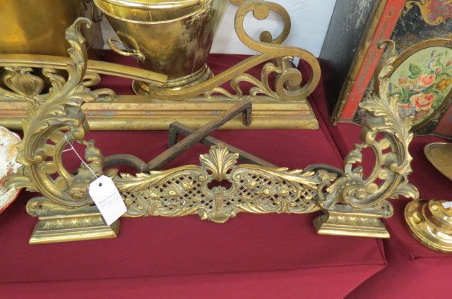 19th Century Louis XV Style Chenets,: with brass fender, acanthus design.