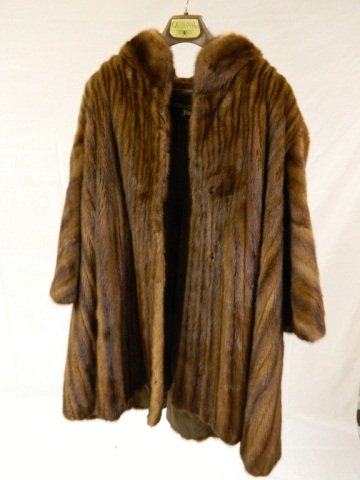 Brown Mink Coat Sorbara For Neiman Marcus: In pristine condition. The owners name was sewn on the inside. Beautiful Coat! Length: 40" Arm: 29" Back Width: 27" Bust: 29"