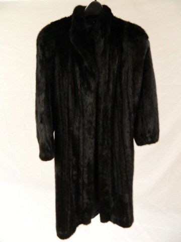 Rosalee Black Mink Fur Coat: Mink Coat in great condition. Does have owners name sewn on the inside. Length: 47 1/2" Arm Length: 29 1/2" Back Width: 21" Bust: 22"