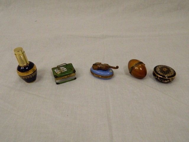 Limoges France Set Of 5 Porcelain Trinkets/Boxes: All in Great Condition! Made in France Set of 3 Limoges Porcelain Trinket Boxes Book w/ glasses, Football, & Violin. Also in this grouping is a blue ceramic limoges with a free standing lid and a matc