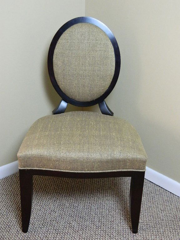Oval X -Back Upholstered Side Chair by Baker: The Barbara Barry Collection by Baker, Oval X -Back upholstered side chair. Raw silk weave upholstery. In good condition. 38" Tall 23" Wide and 24" deep.
