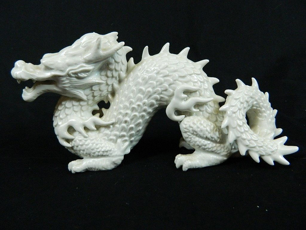 Vtg. Fitz and Floyd Oriental Dragon Ceramic Statue: Up for auction is a Fitz and Floyd oriental statue in great condition! It is very unique! The bottom reads F22/32. the dragon is about 10 1/2 inches long and 5 1/2 inches tall. Shipping Weight: 3 lb