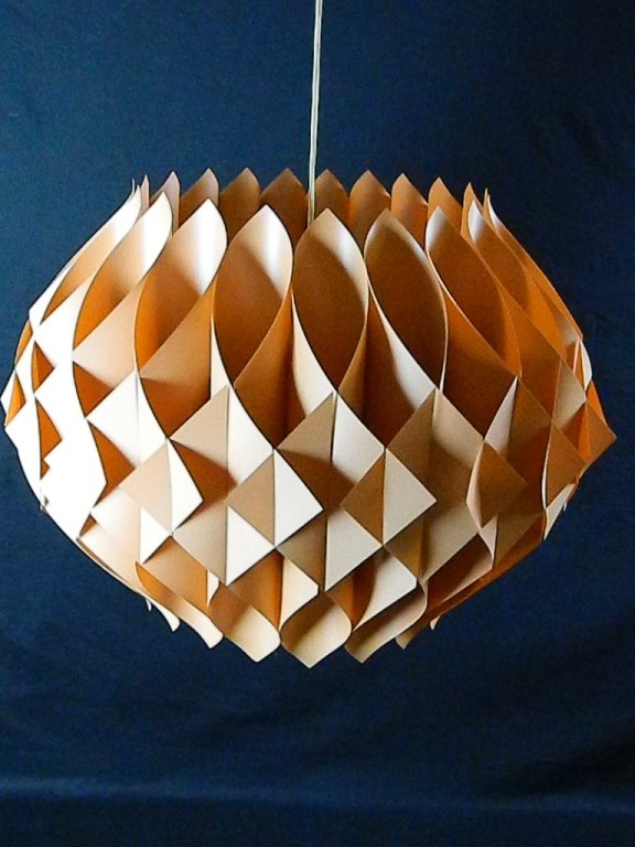 Dansk Danish Hanging Ceiling Lamp: Up for auction is a very unique Dansk ceiling lamp in great working condition! It lights up like a charm! The lamps is about 21 inches wide. This is a very unique and interesting lamp!