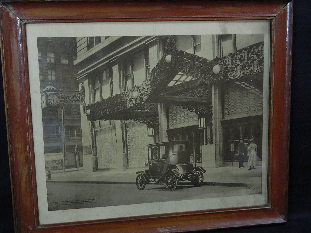 Framed print of Entance to Marshall Field and Co: Wood Framed Print of the Entrance to Marshall Field and Co.in Chicago,IL from 1911.Frame is 21"x25" Frame has many scuffs and is in fair condition.