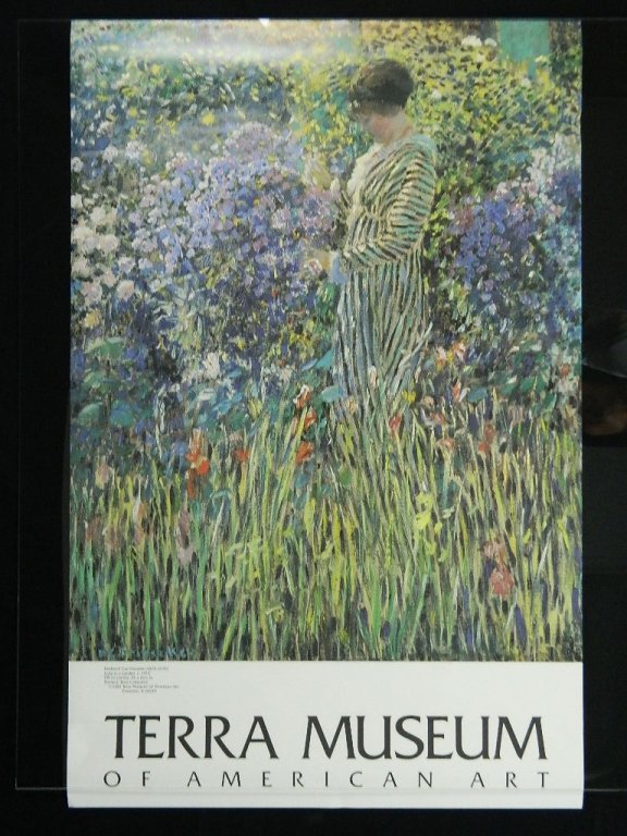 Fredrick Frieseke Terra Museum Poster: Up for auction is a Terra Museum of American Art poster in good condition. On the poster is a print of Fredrick Carl Frieseke's painting of Lady in a Garden. The poster measures 32" x 20 3/4".