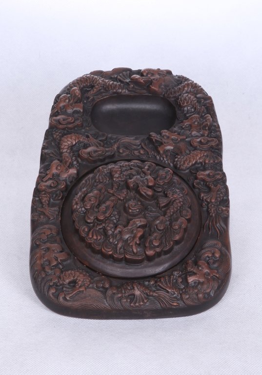 Chinese Inkstone with Many Dragons: Chinese Inkstone , the ink well cover depitcting 2 writhing dragons. The body with many dragons.