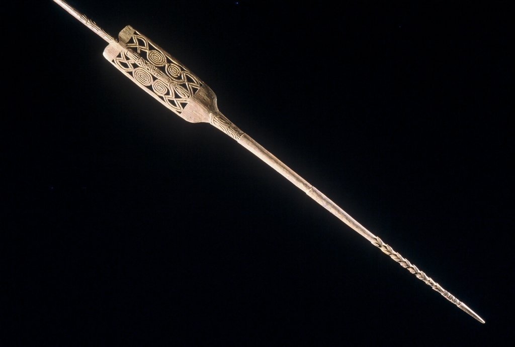 Papua New Guinea Asmat Spear: #183 102.75" long spear, unpainted wood . Itegral barbs at tip, open work design approximately 34' from tip.