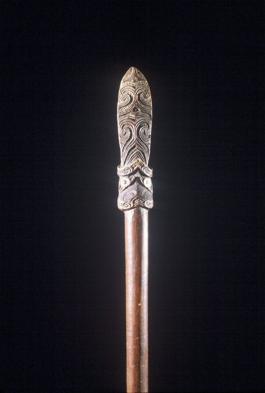 Papua New Guinea Maori Taiaha Weapon: #329 52" long 19-20 century Maori taiaha stained dark brown. In good condition but missing a jewel representing an eye on one side of the maori. A maori taiaha is a traditional weapon usually between 