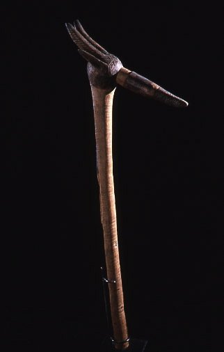 African Chief's Staff: #235 29" head of what resembles a gazelle at top of piece sets on a stand, unpainted. Has been repaired.Mossi Tribe, Upper Volta Area.