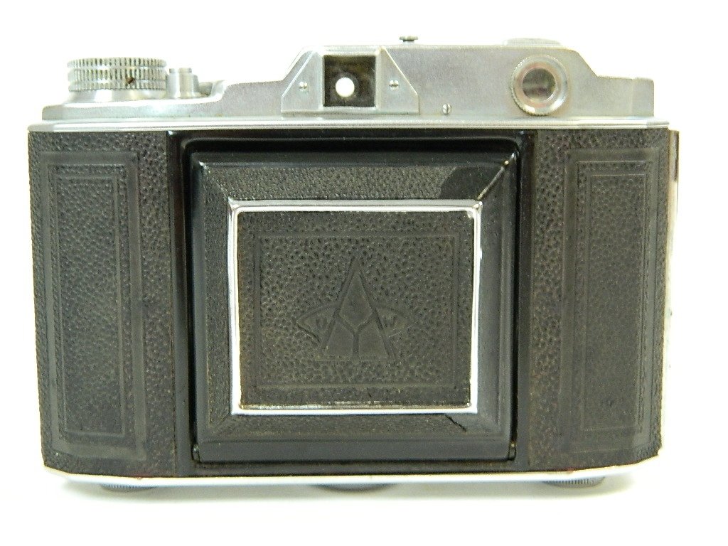 Vintage Atom-Six (6)12EX Still Camera w/ Case: This auction item is a wonderful Atom -Six Camera with its original brown leather case. It is a 6 by 6 folding camera made by Atom Koki Seisakusho,