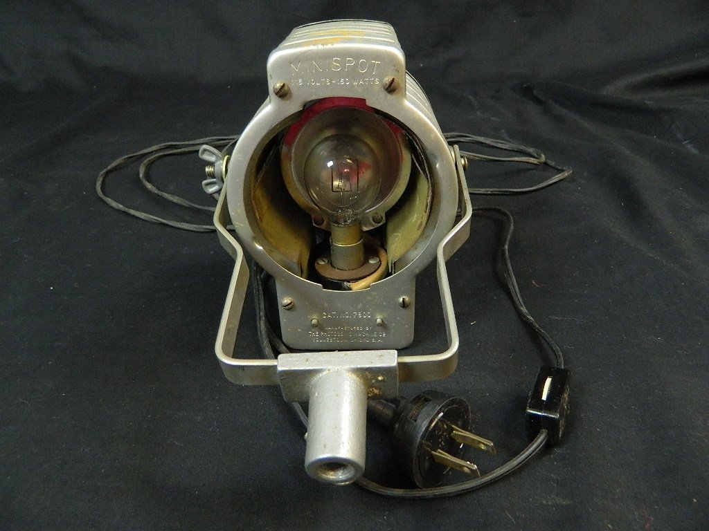 photogenic Machine Co. Minispot 115 v 150 w: Minispot Spotlight by The Photogenic Machine Co. This spotlight is in good working condition and turns right on although it is missing the front fresnel lens.