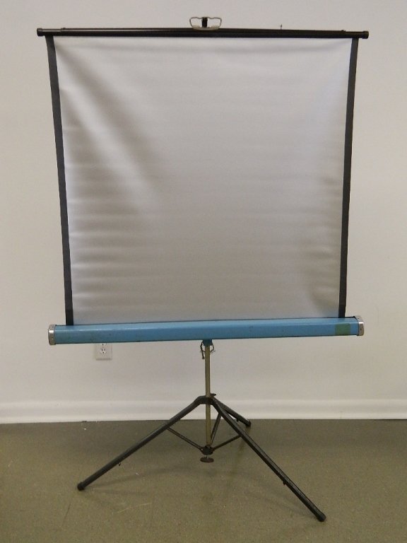Vintage Radiant Projection screen 38" x 39": Vintage radiant portable projection screen 38" x 39". Stands 65" tall. Everything still functions properly.