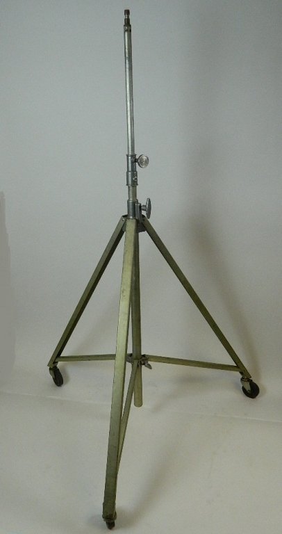 Colortran Photoraphic Lighting Tripod on Casters: Colortran Photographic Lighting Equipment Tripod Stand on Casters. This tripod has a light green hue. extends to 88".