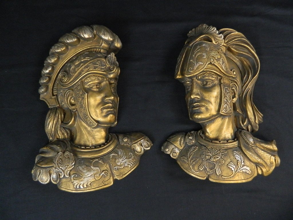 Pair of Infrangible 19" Warrior Head Wall Mounts: Up for sale we have a pair of Infrangible warrior head wall plaques.Made by the Universal Statuary Corp. circa 1961. They are 19" by 15".