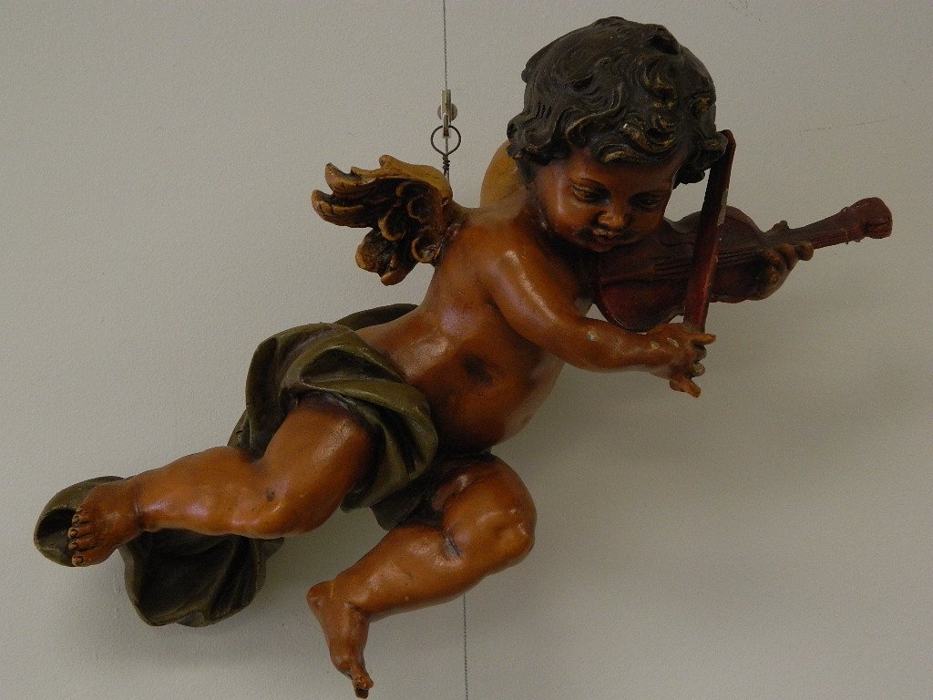 21" Violin Playing Cherub Wall Hanger: Up for sale we have a violin playing cherub wall hanger. He is 21" long and 15 1/2" wide.