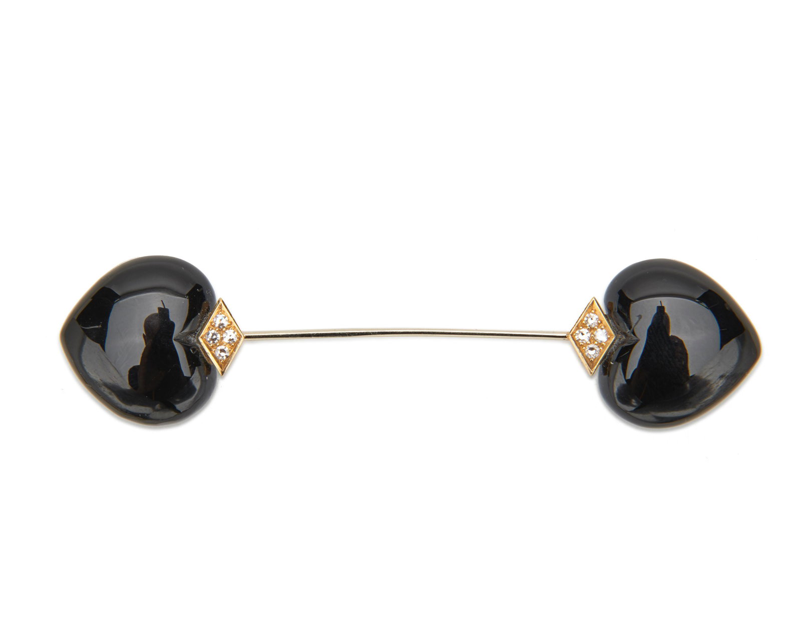 18K Gold, Diamond, and Onyx Jabot Brooch: 18K Gold, Diamond, and Onyx Jabot Brooch the jabot brooch with two polished black onyx hearts measuring approx. 20.50 x 21.50 mm. and eight single-cut diamonds weighing approx. 0.25 tcw.; 10.37 dwts.;