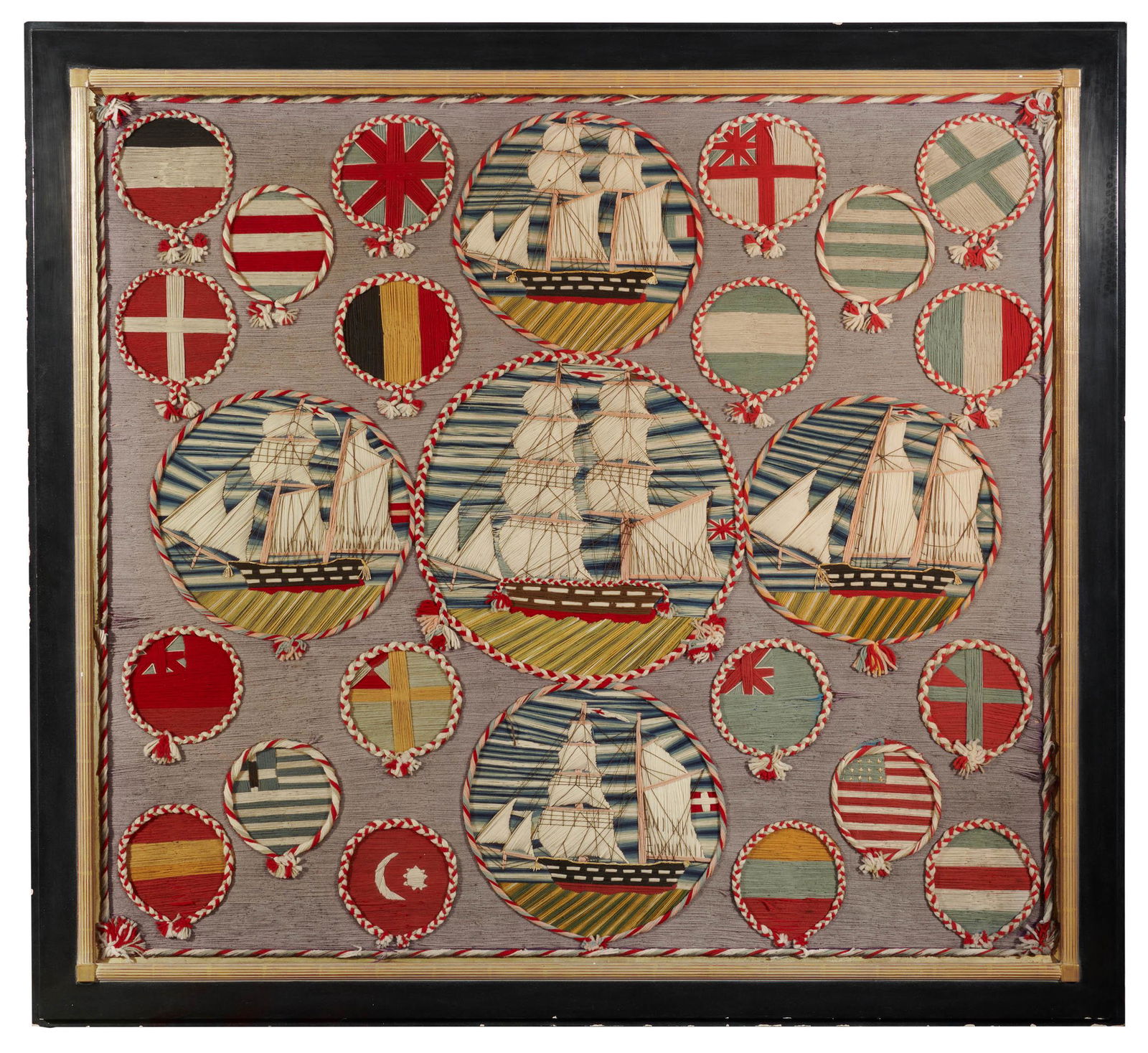 Stitched and Woven Nautical Woolwork, British, ca. 1900: Stitched and Woven Nautical Woolwork, British, ca. 1900depicting five ships surrounded by nautical flags;48 x 53 in., frame: 55 x 60 in.Provenance: A Beacon Hill, Boston, Massachusetts Collection.