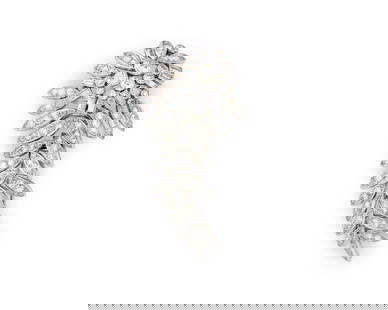 SUZANNE BELPERRON Platinum/18K Gold and Diamond Brooch: SUZANNE BELPERRON Platinum/18K Gold and Diamond Broochca. 1942-55; the double-brooch of stylized flower and leaf-form set throughout with old European-, old mine-, and baguette- cut diamonds weighing