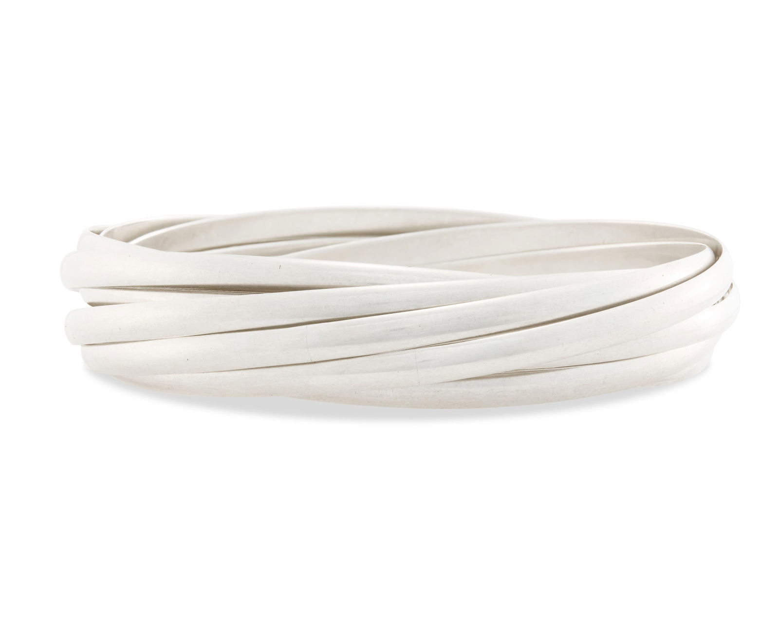 TIFFANY & CO., PALOMA PICASSO Silver Bracelet: TIFFANY & CO., PALOMA PICASSO Silver Braceletthe bangle bracelet featuring 9 overlapping bangles of polished silver; signed Paloma Picasso Tiffany & Co.; 2.05 ozt.; int. cir. 7 1/2 in.