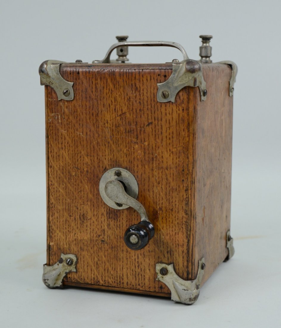 OAK AND NICKEL BRASS HAND CRANK GENERATOR, circa 1900